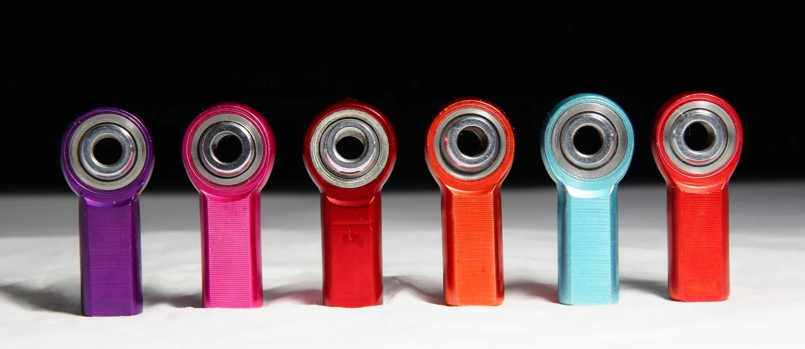 Aluminum rod ends in multiple anodized colors