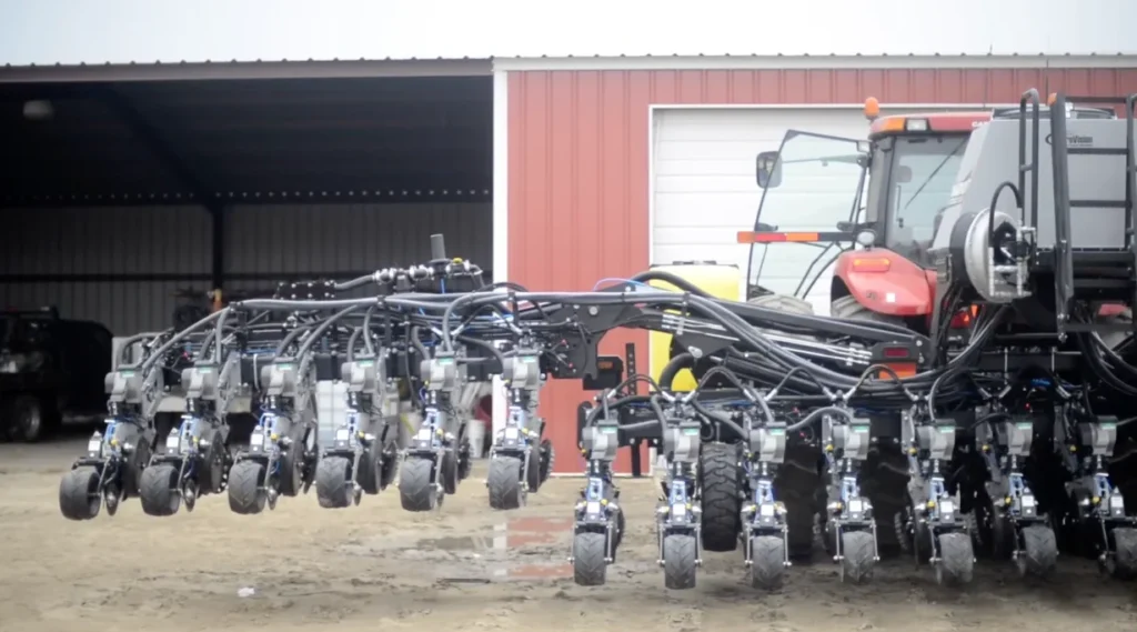 Seed drill wing folding mechanism