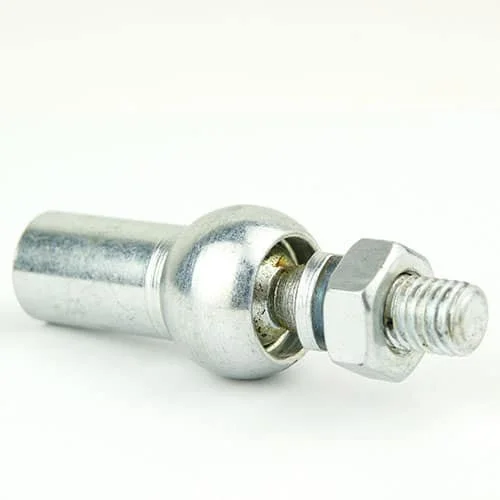 Metal fastener: a threaded bolt with a hex nut attached, resting on a white surface